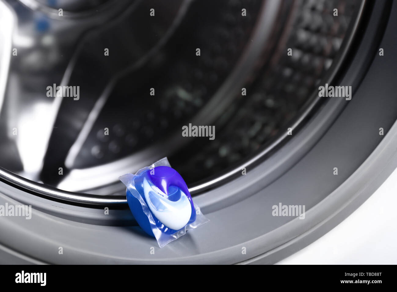 Washing machine with detergent pod, closeup Stock Photo Alamy