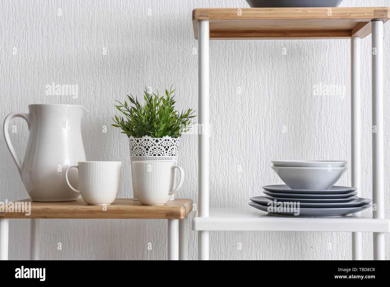 Clean dishes on shelves in kitchen Stock Photo Alamy