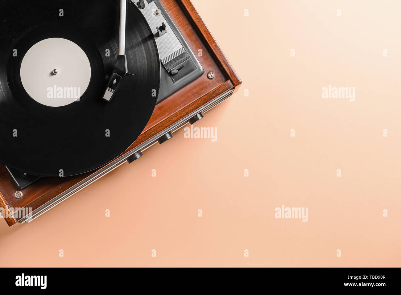 Record player with vinyl disc on color background Stock Photo - Alamy