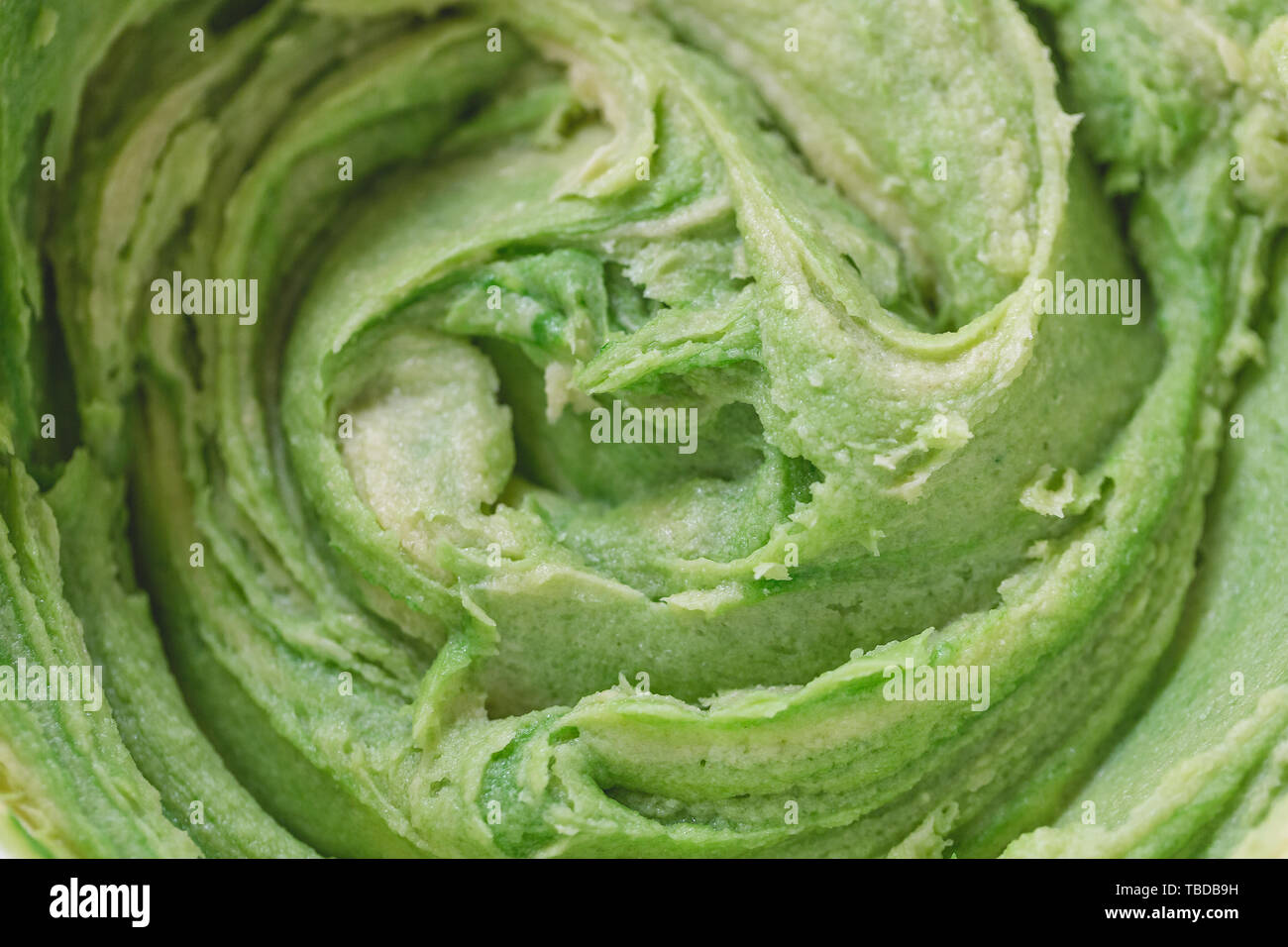 Close up on green cookie dough. Saint Patricks Day and Easter baking concept. Top view, flat lay, copy space. Stock Photo