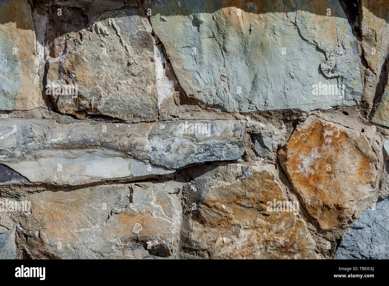 Wall from large stone textured basalt. Good background for wallpaper