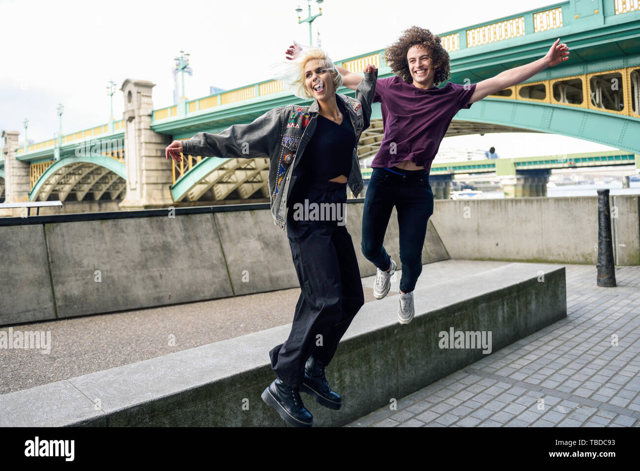 Friends jumping into river hi-res stock photography and images - Alamy