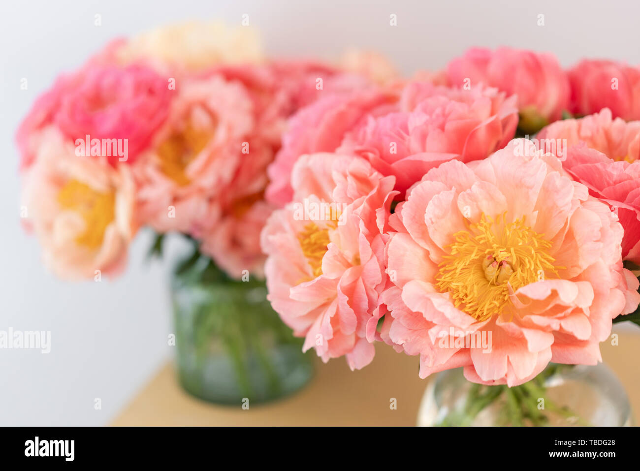 Cozy And Atmosphere At Home Two Glass Vases With Coral Peonies