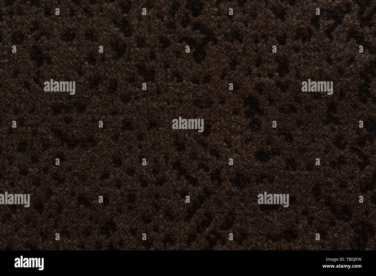 Marvelous textile background with dark brown surface. High resolution photo. Stock Photo