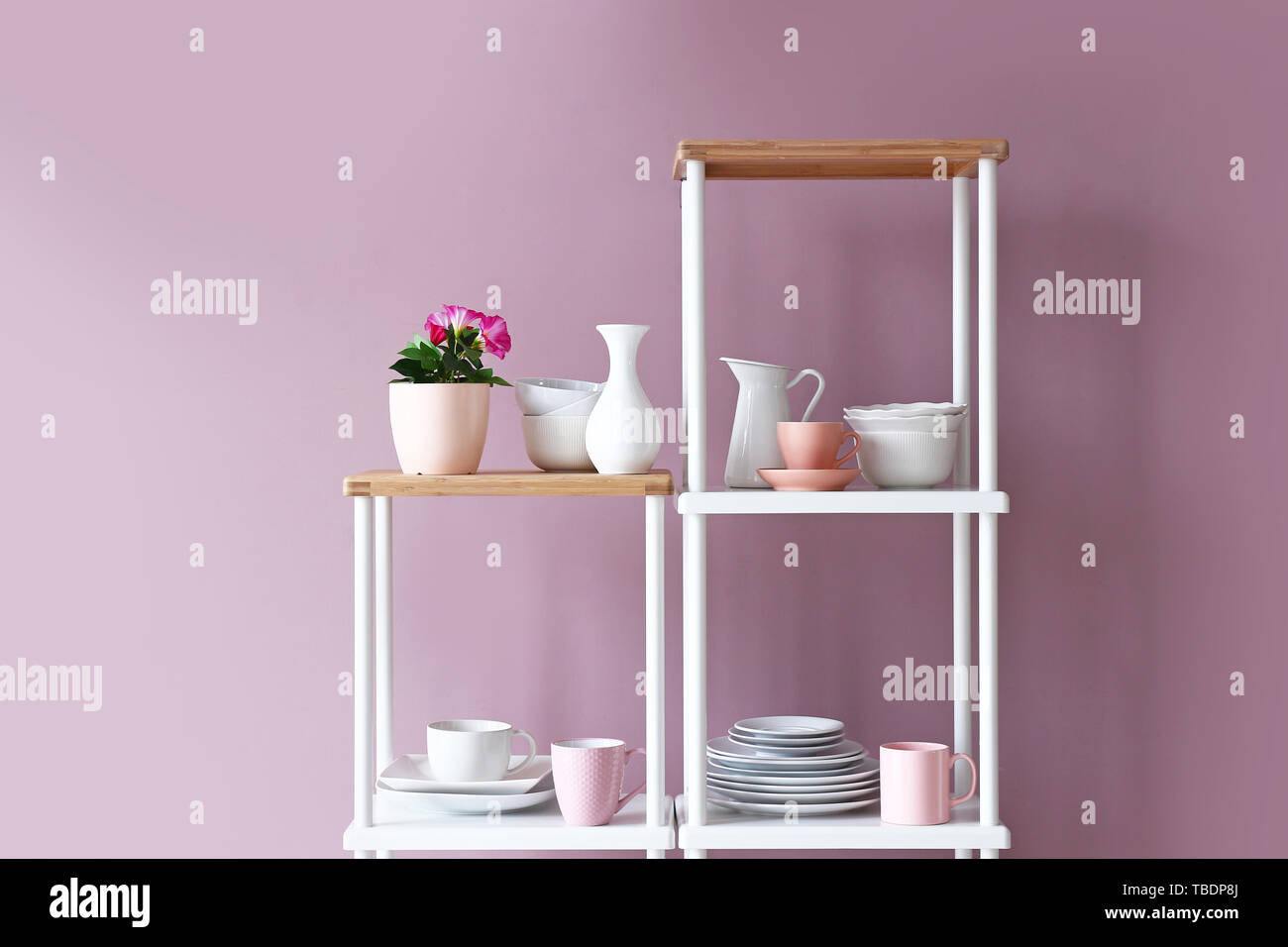 Rack with clean dishes in kitchen Stock Photo Alamy