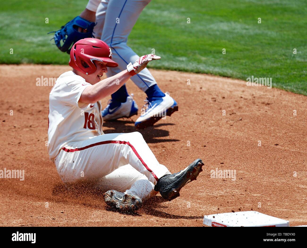 May 31, 2019: Razorback outfielder Heston Kjerstad #18 slides safely into third base. Arkansas defeated Central Connecticut 11-5 in Fayetteville, AR, Richey Miller/CSM Stock Photo