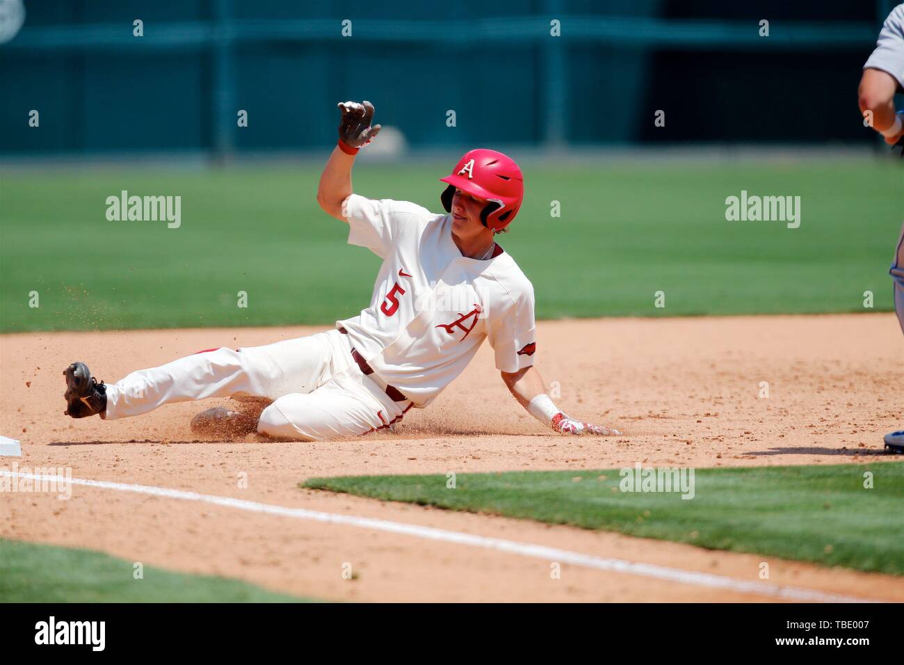 May 31, 2019: Jacob Nesbit #5 Arkansas baserunner slides safely into third base. Arkansas defeated Central Connecticut 11-5 in Fayetteville, AR, Richey Miller/CSM Stock Photo