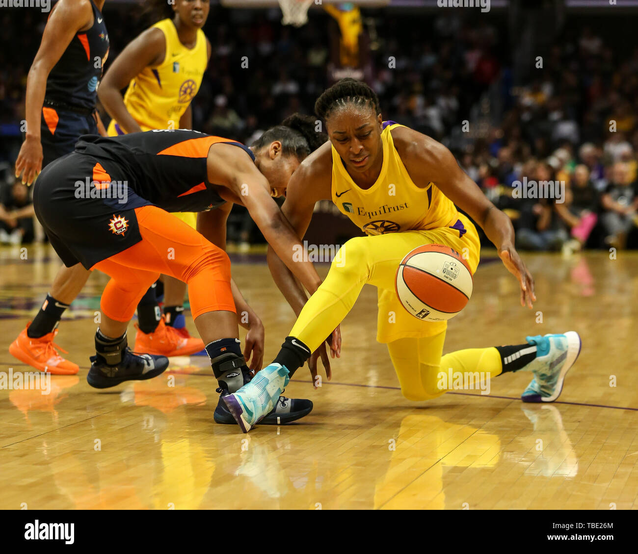 Los Angeles Sparks forward Nneka Ogwumike #30 dribbling from her knees during the Connecticut Sun vs Los Angeles Sparks game at Staples Center in Los Angeles, Ca on May 31, 2019. (Photo by Jevone Moore) Stock Photo