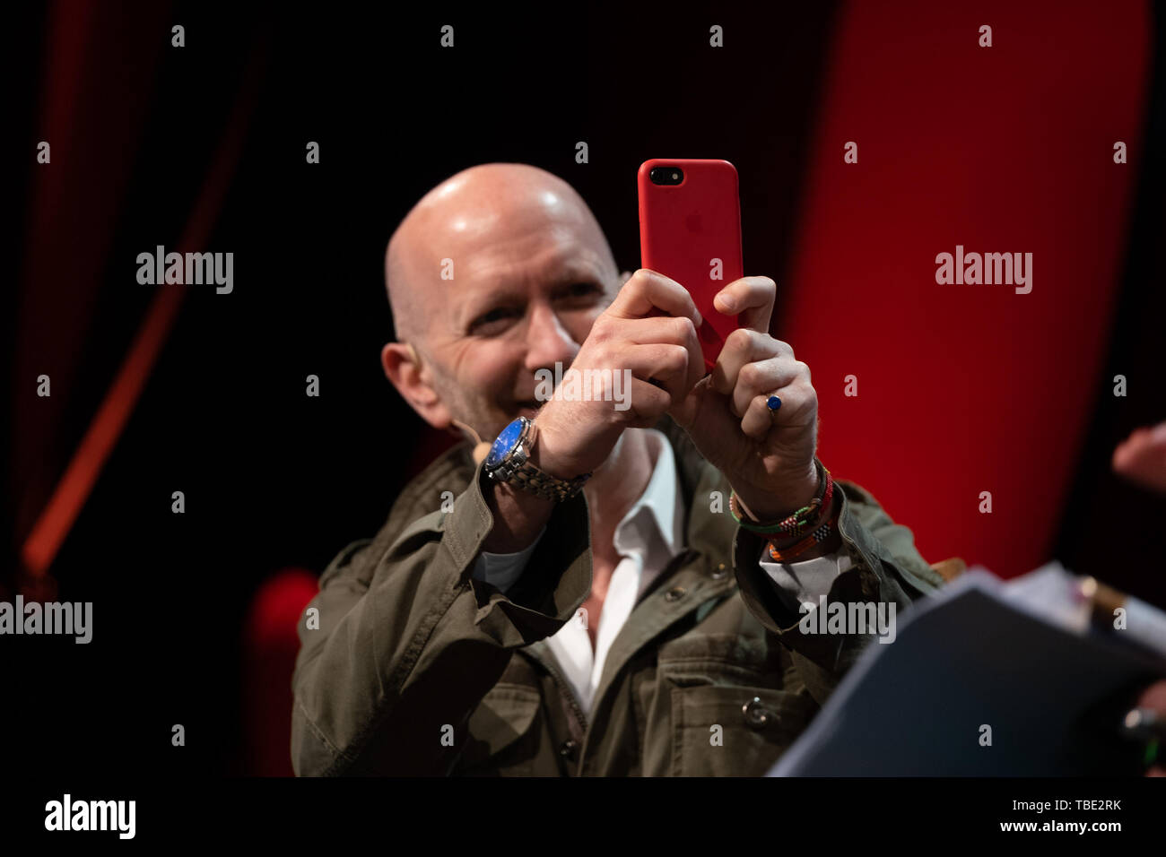 The Hay Festival, Hay on Wye, Wales UK , Saturday 01 June 2019.   Simon Sebag Montefiore, historian and writer, takes a photo of the audience from the stage  at the 2019 Hay Festival   The festival, now in its 32nd year, held annually in the small town of Hay on Wye on the Wales - England border,  attracts the finest writers, politicians and intellectuals from  across the globe for 10 days of talks and discussions, celebrating the best of the written word and critical debate  Photo © Keith Morris / Alamy Live News Stock Photo