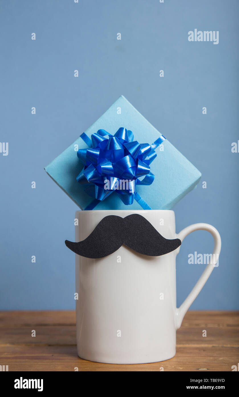 Father's day present with a coffee mug and paper mustache Stock Photo