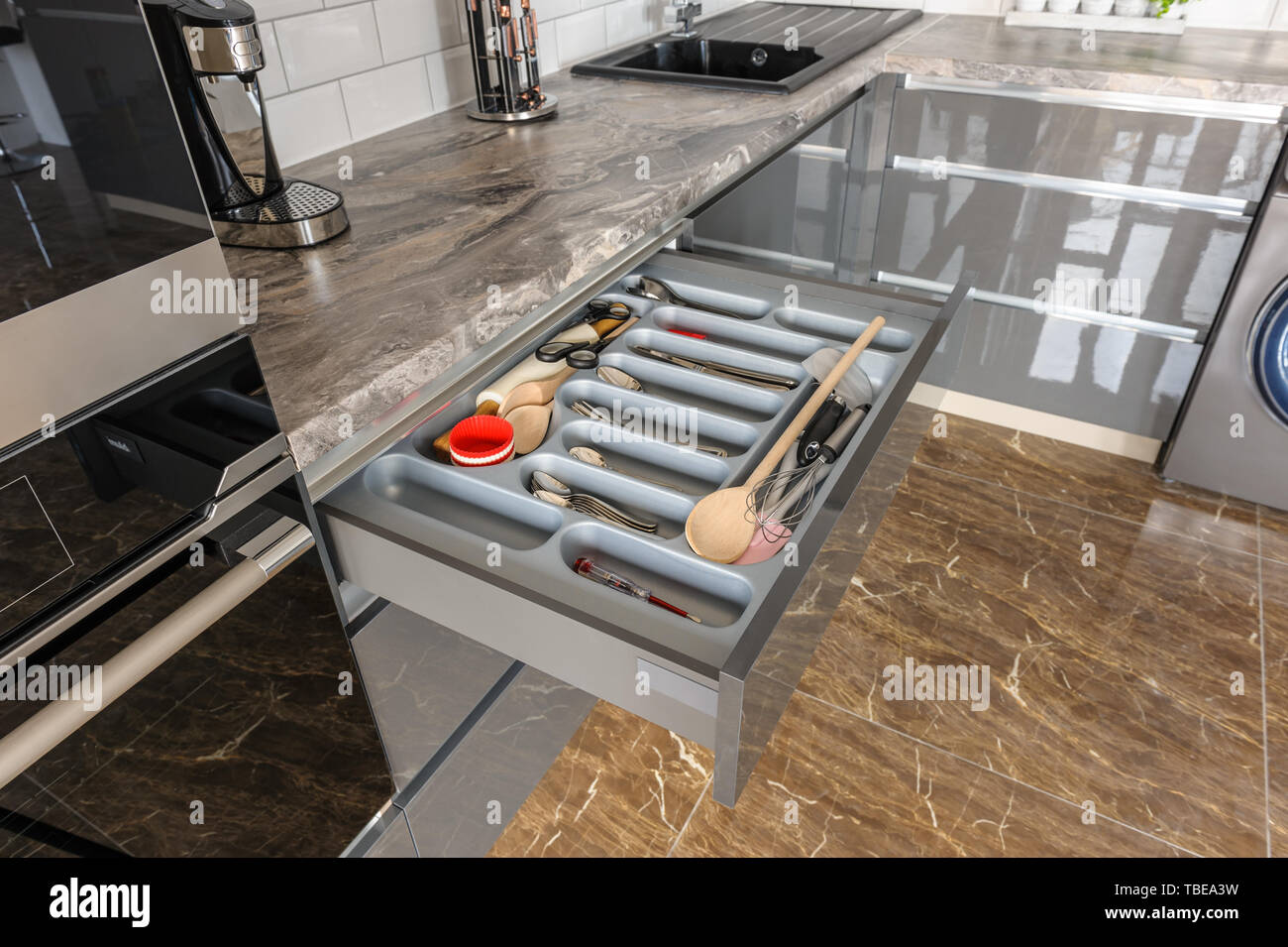 Luxury modern white, beige and grey kitchen interior Stock Photo - Alamy