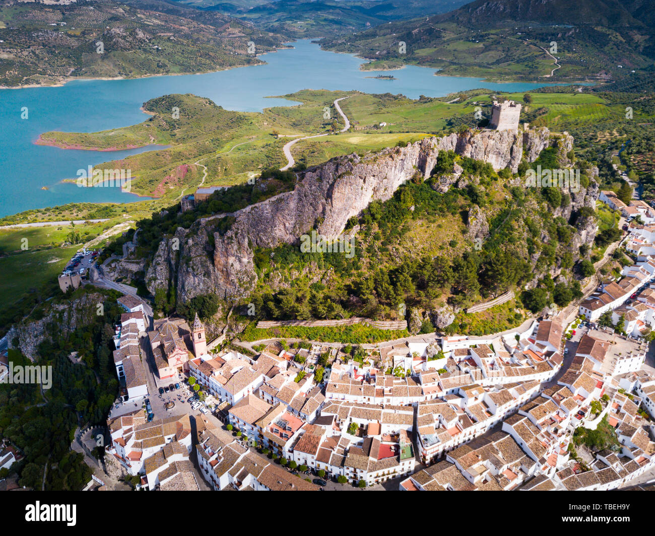 Picturesque aerial view of Zahara de la Sierra with ancient castle on ...