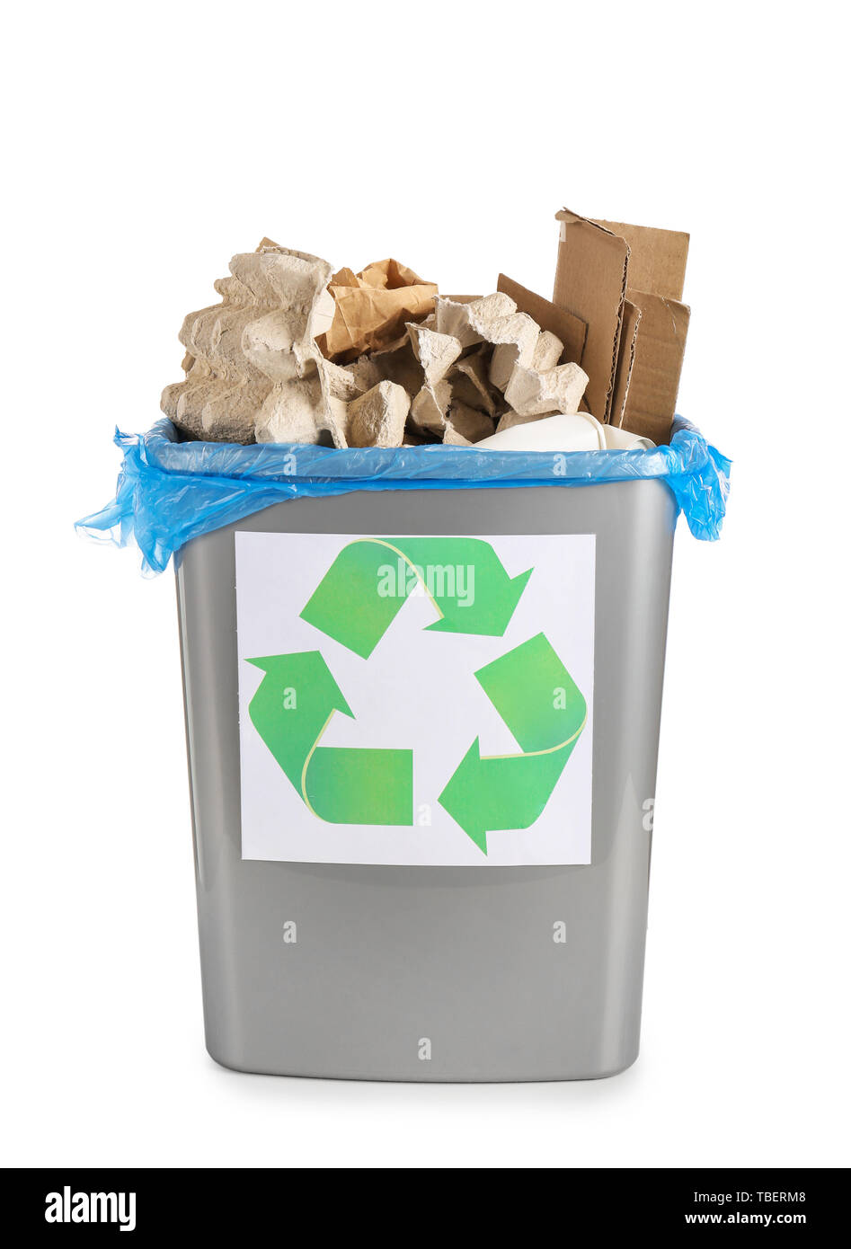 Trash bin with paper garbage on white background Stock Photo