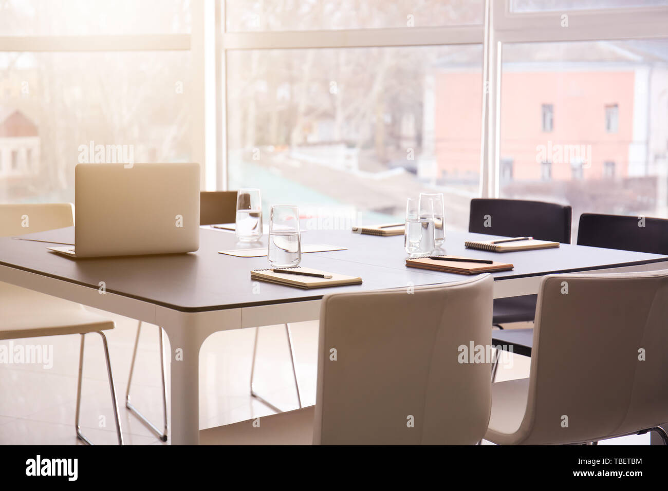 Meeting In Table Table prepared for business meeting in conference hall Stock Photo - Alamy