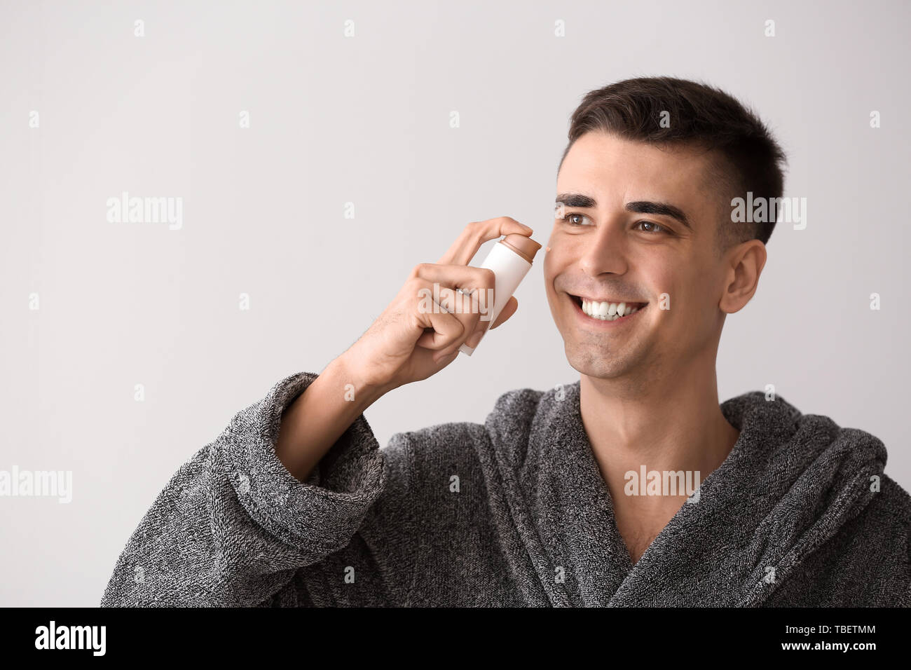 Man applying skin serum on hi-res stock photography and images - Alamy