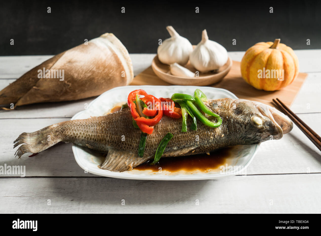 Steamed sea bass, traditional Cantonese cuisine Stock Photo Alamy
