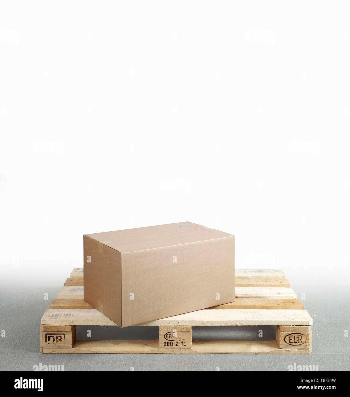Cardboard on Euro pallet, Germany Stock Photo - Alamy