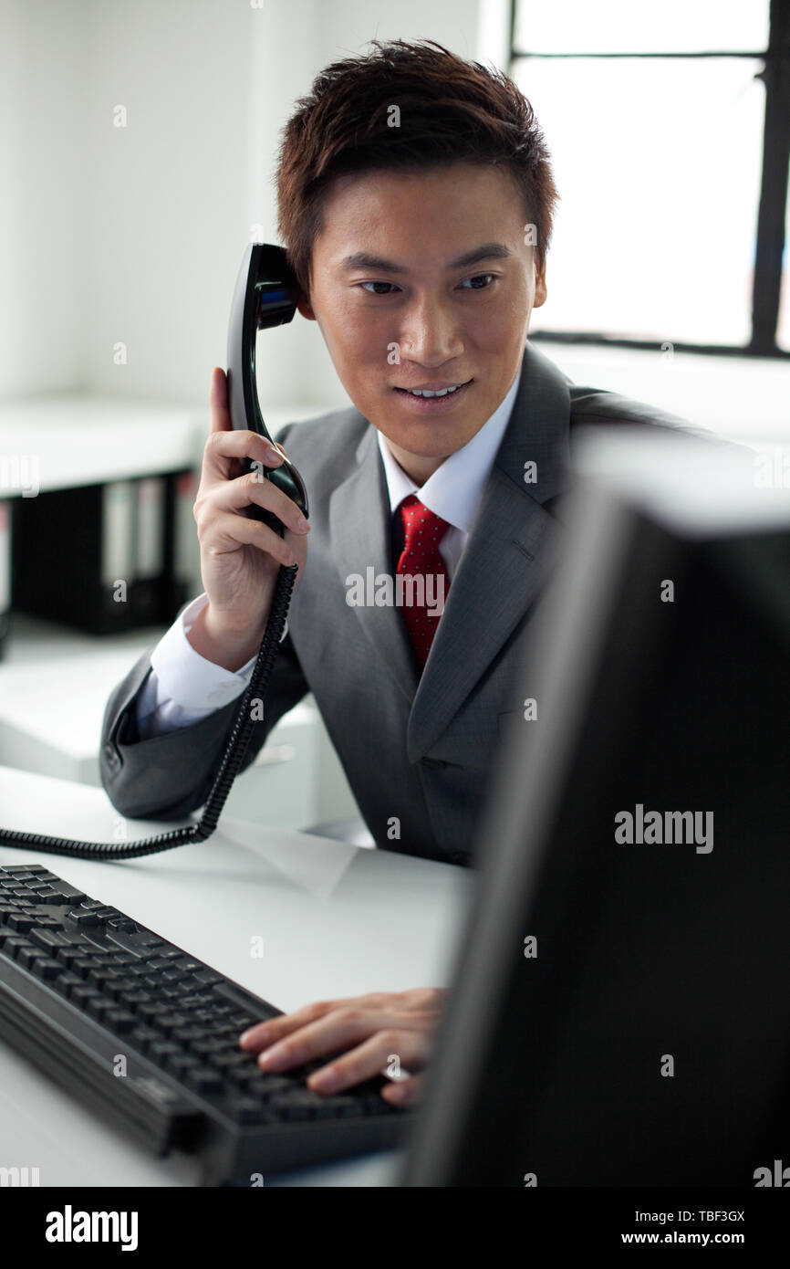 A manager works in an office. Stock Photo