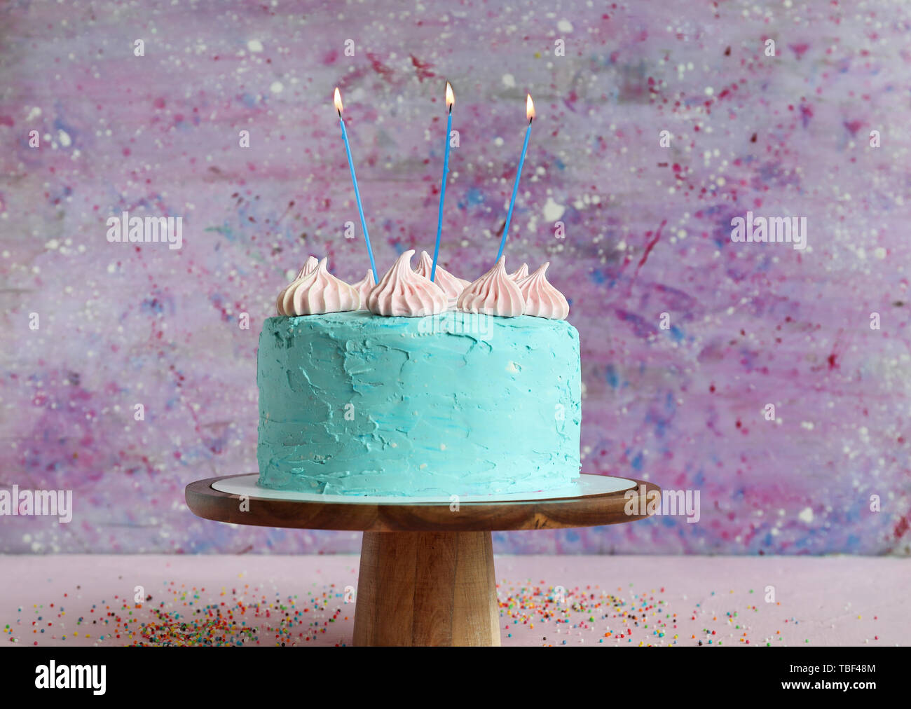 Tasty Birthday cake on table against color background Stock Photo - Alamy