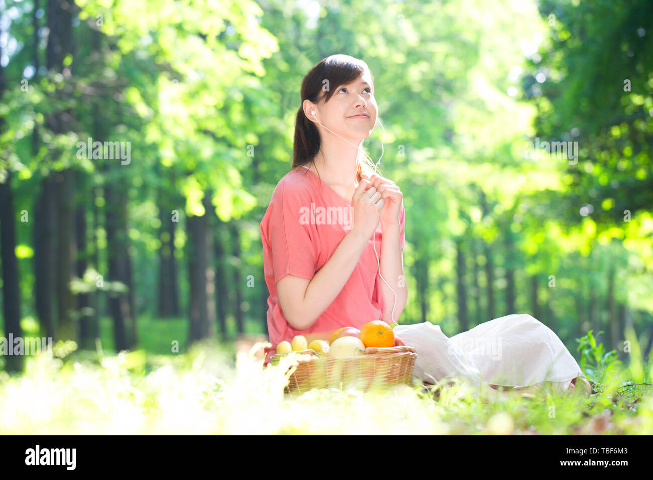 A young woman on an outing in the park. Stock Photo