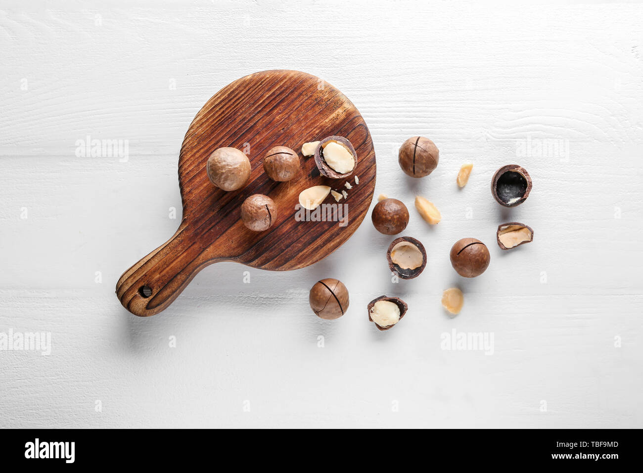 Tasty macadamia nuts on white table Stock Photo