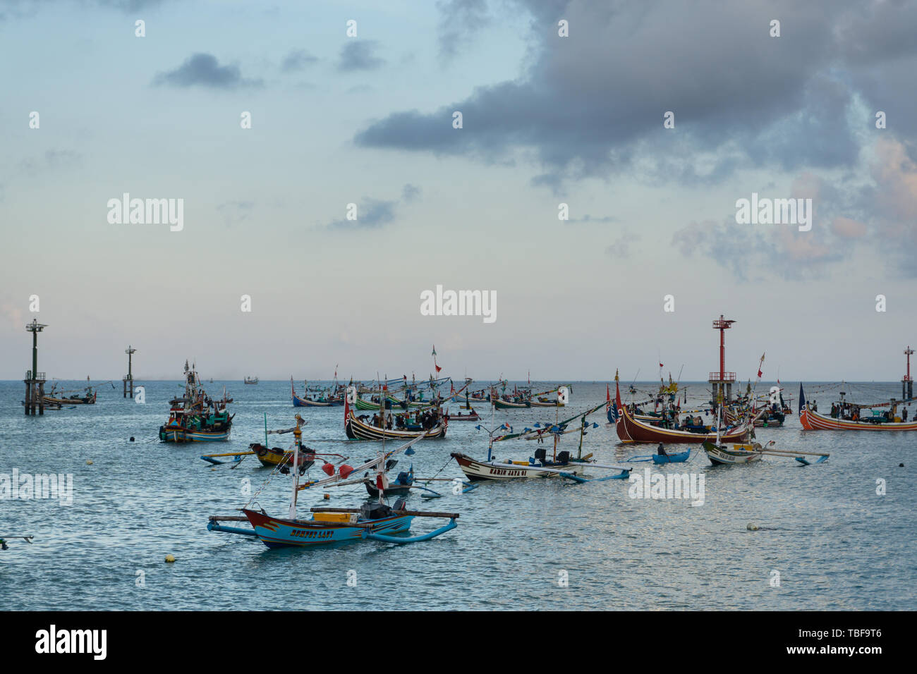 JIMBARAN/BALI-MAY 15 2019: Some traditional Balinese boats are fishing ...