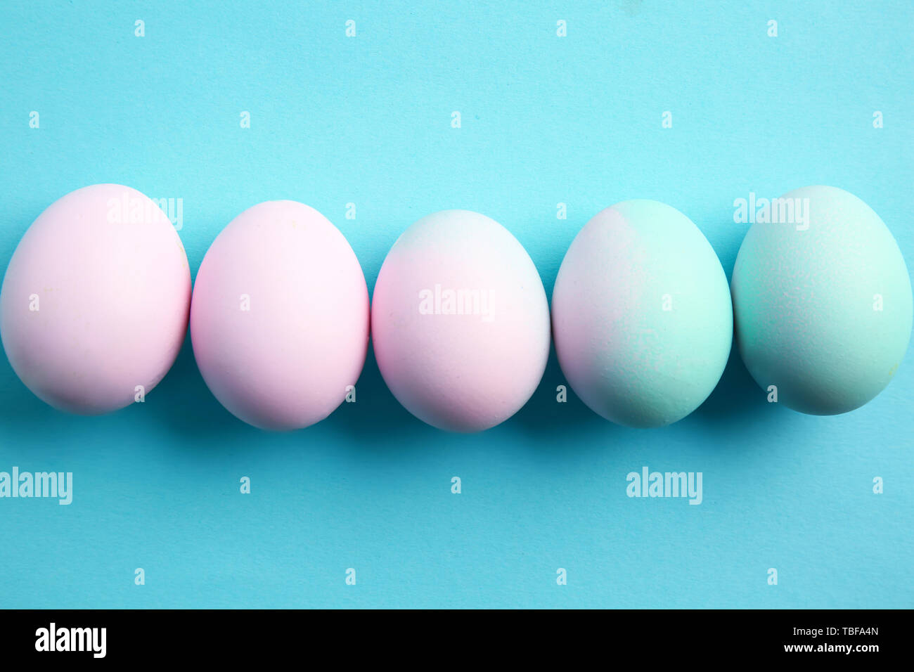 Beautiful Easter eggs on color background Stock Photo
