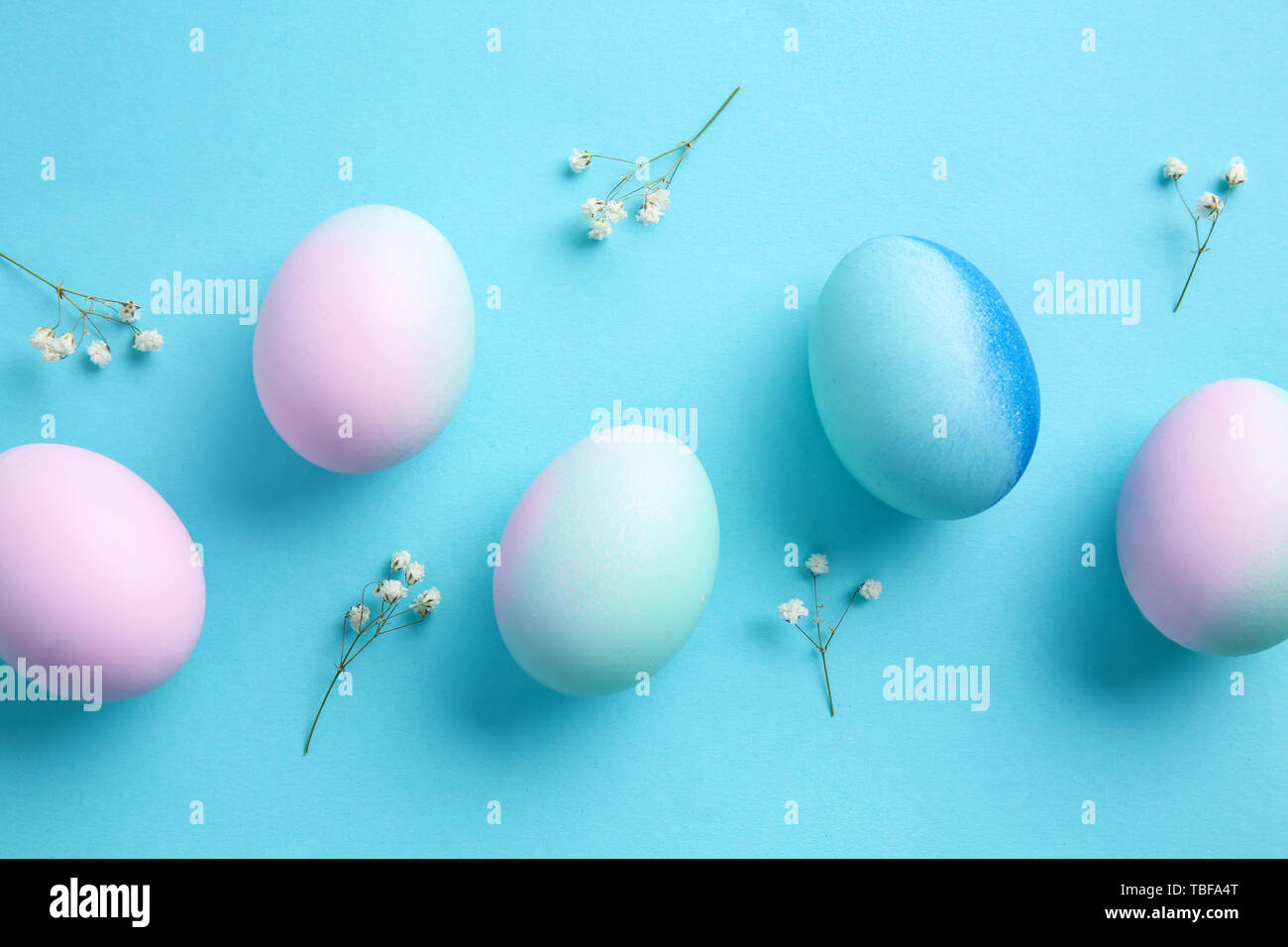 Beautiful Easter eggs on color background Stock Photo