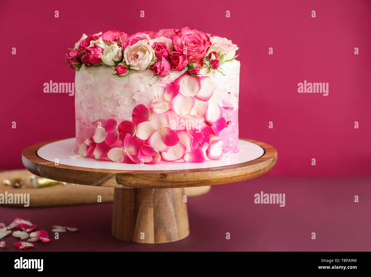 Stand with tasty Birthday cake on color background Stock Photo - Alamy