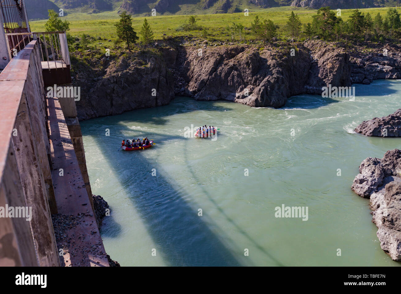 Katun river rafting in Altai mointain. View from the bridge. Sunny summer day. Can used for promotion, ad, greeting card, invitation, poster, article, Stock Photo