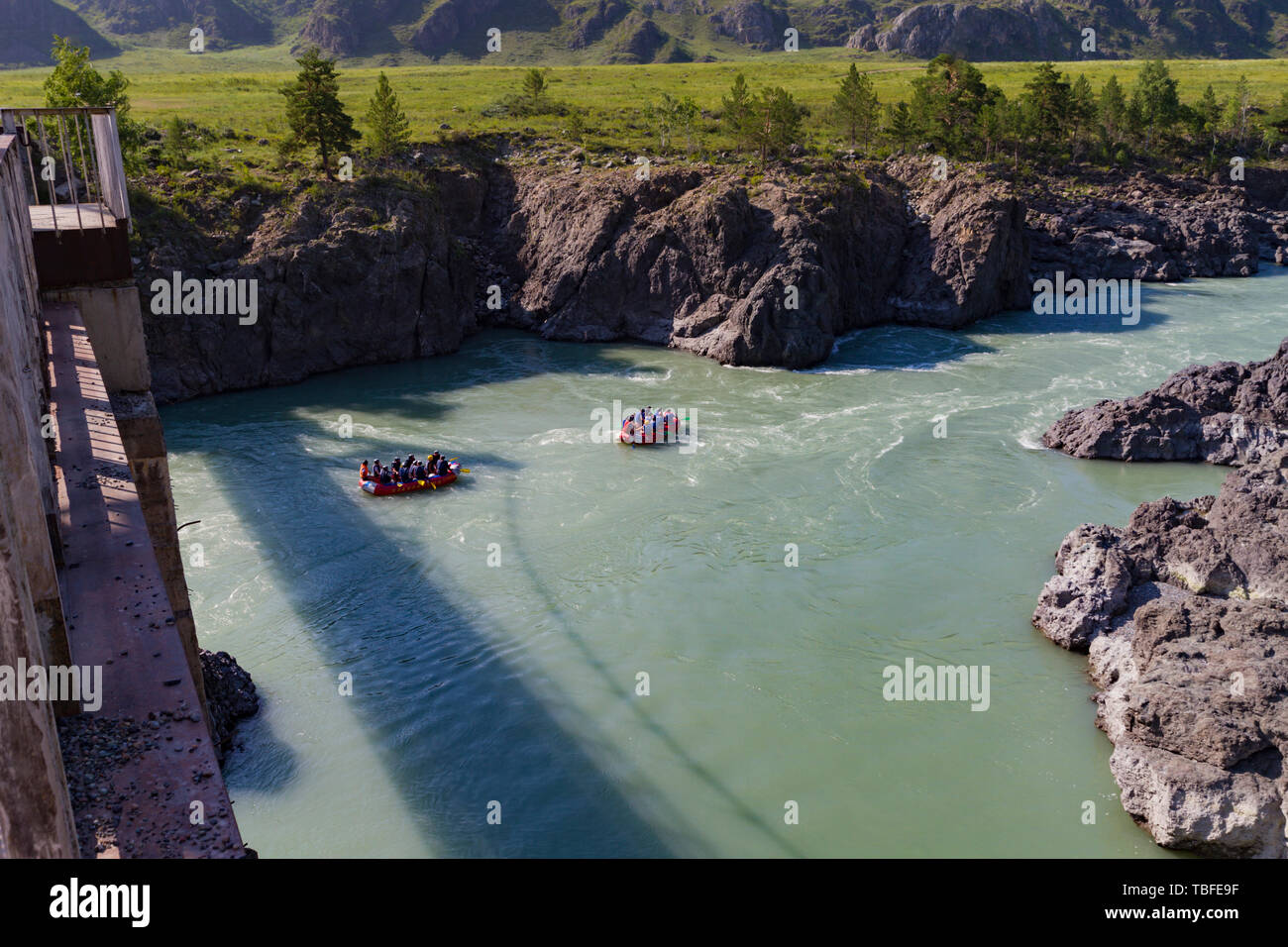Katun river rafting in Altai mointain. View from the bridge. Sunny summer day. Can used for promotion, ad, greeting card, invitation, poster, article, Stock Photo