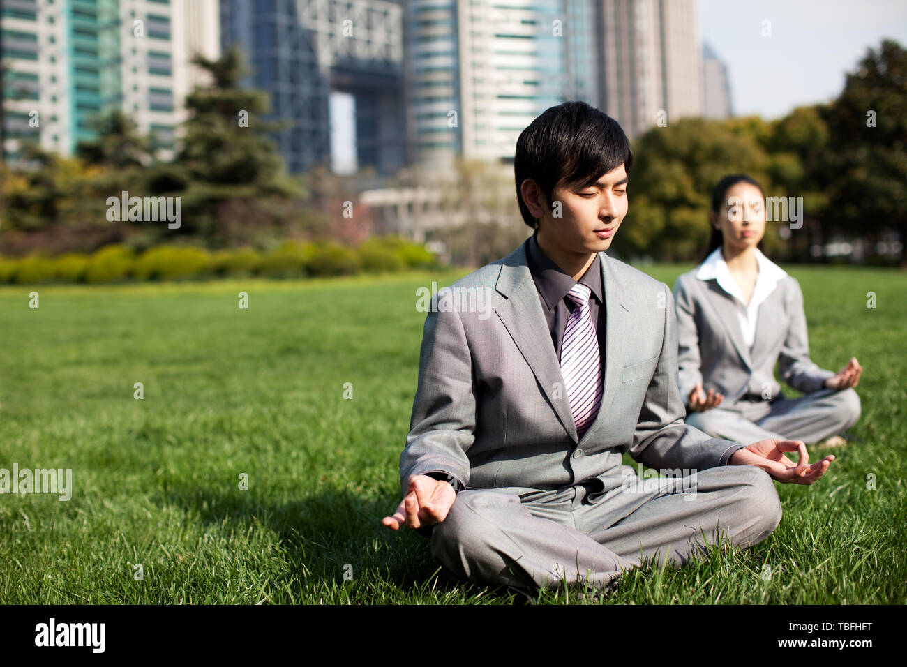 Business people practice yoga outdoors Stock Photo - Alamy