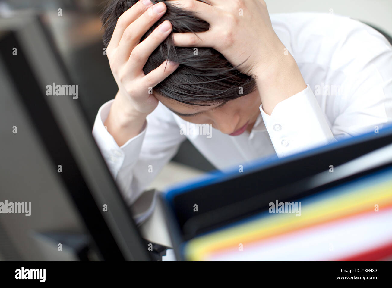 Asian business person stress hi-res stock photography and images - Alamy