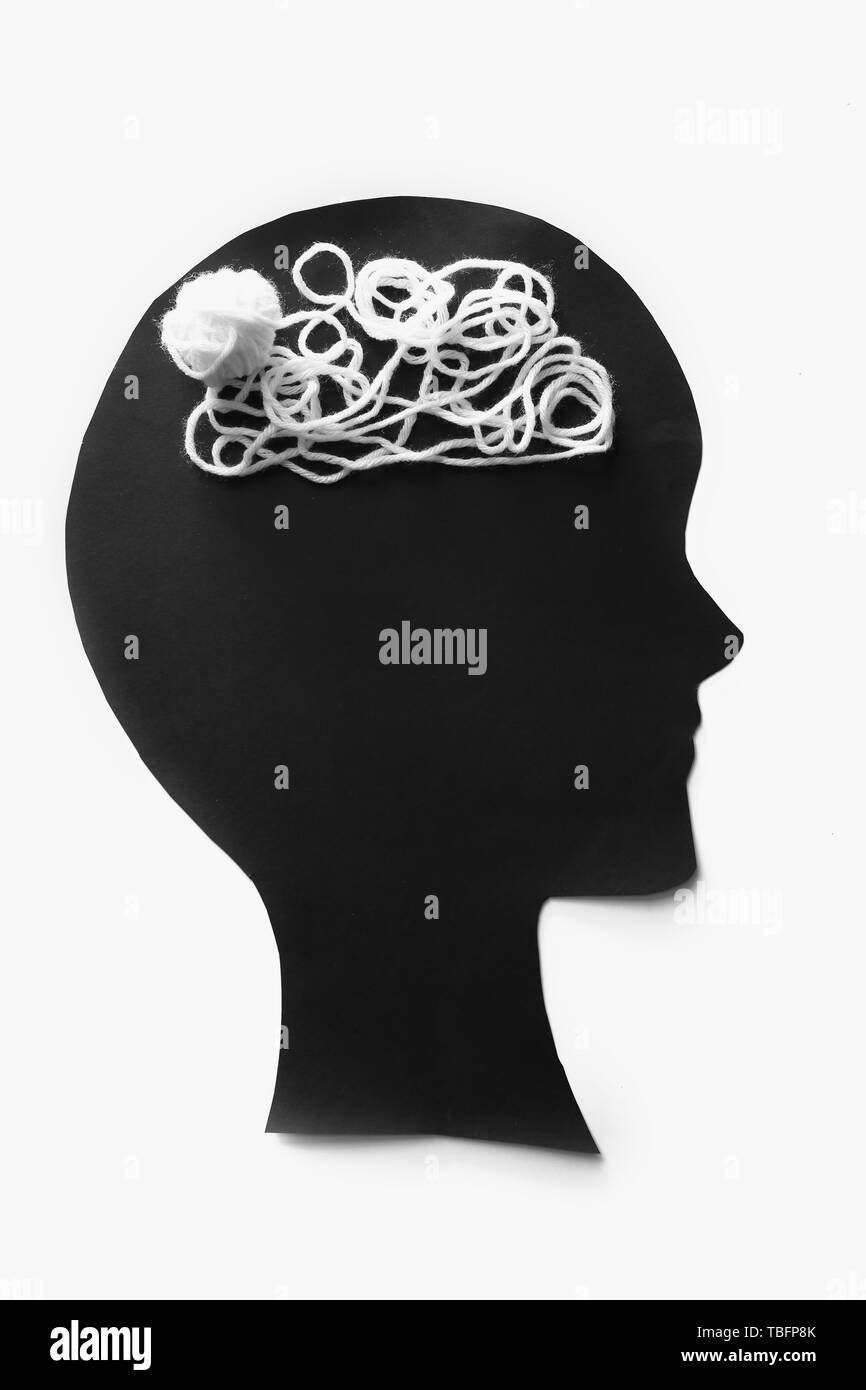 Human head with threads on white background. Concept of healthy brain Stock Photo