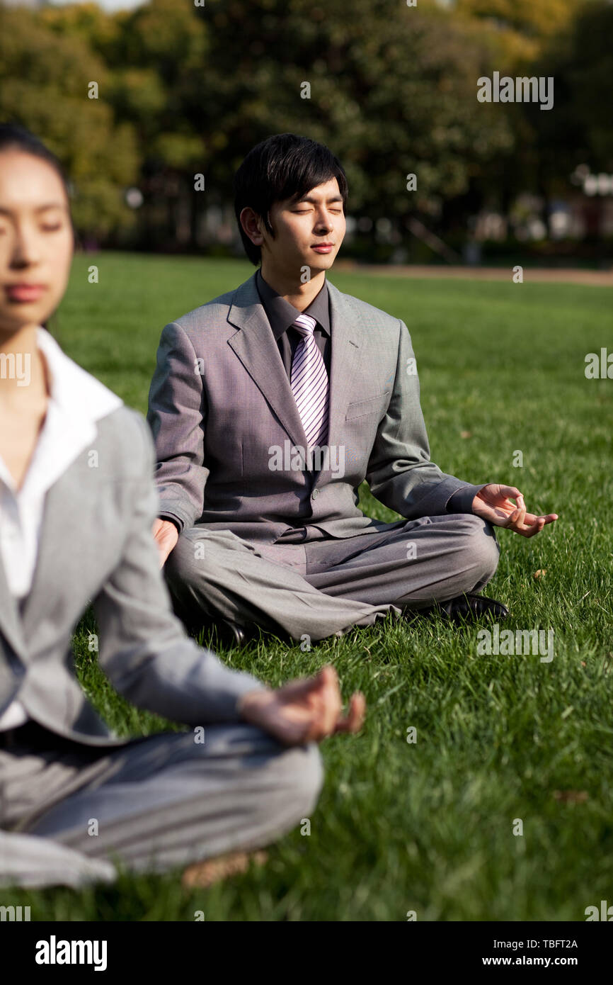 Business people practice yoga outdoors Stock Photo - Alamy