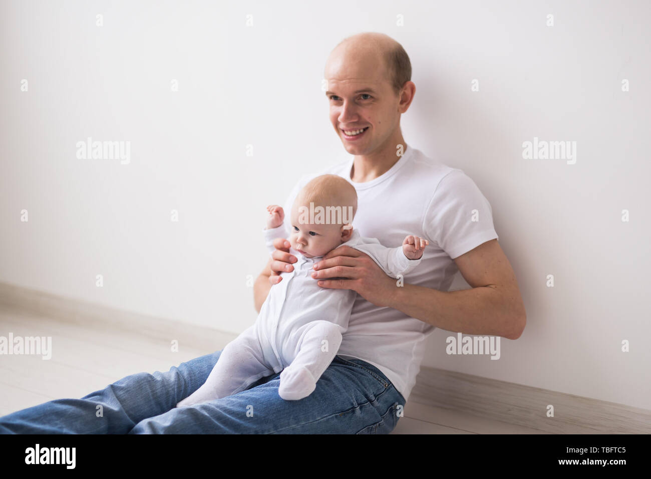 Fatherhood Parenthood And Baby Concept Bald Father Having Fun