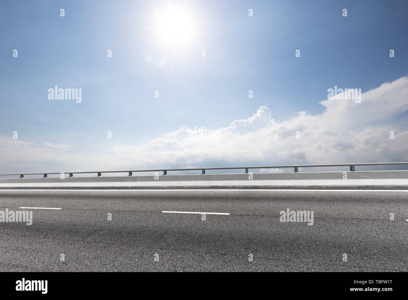 Empty road with blue cloudsky Stock Photo