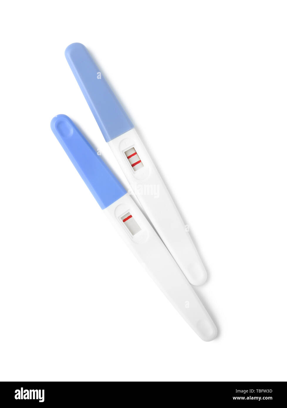 Negative and positive pregnancy tests on white background Stock Photo