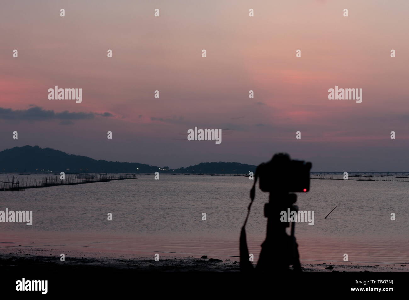 Focus intention, landscape, sea, mountain and fishing tools, local fishermen Use the camera in the foreground. Stock Photo
