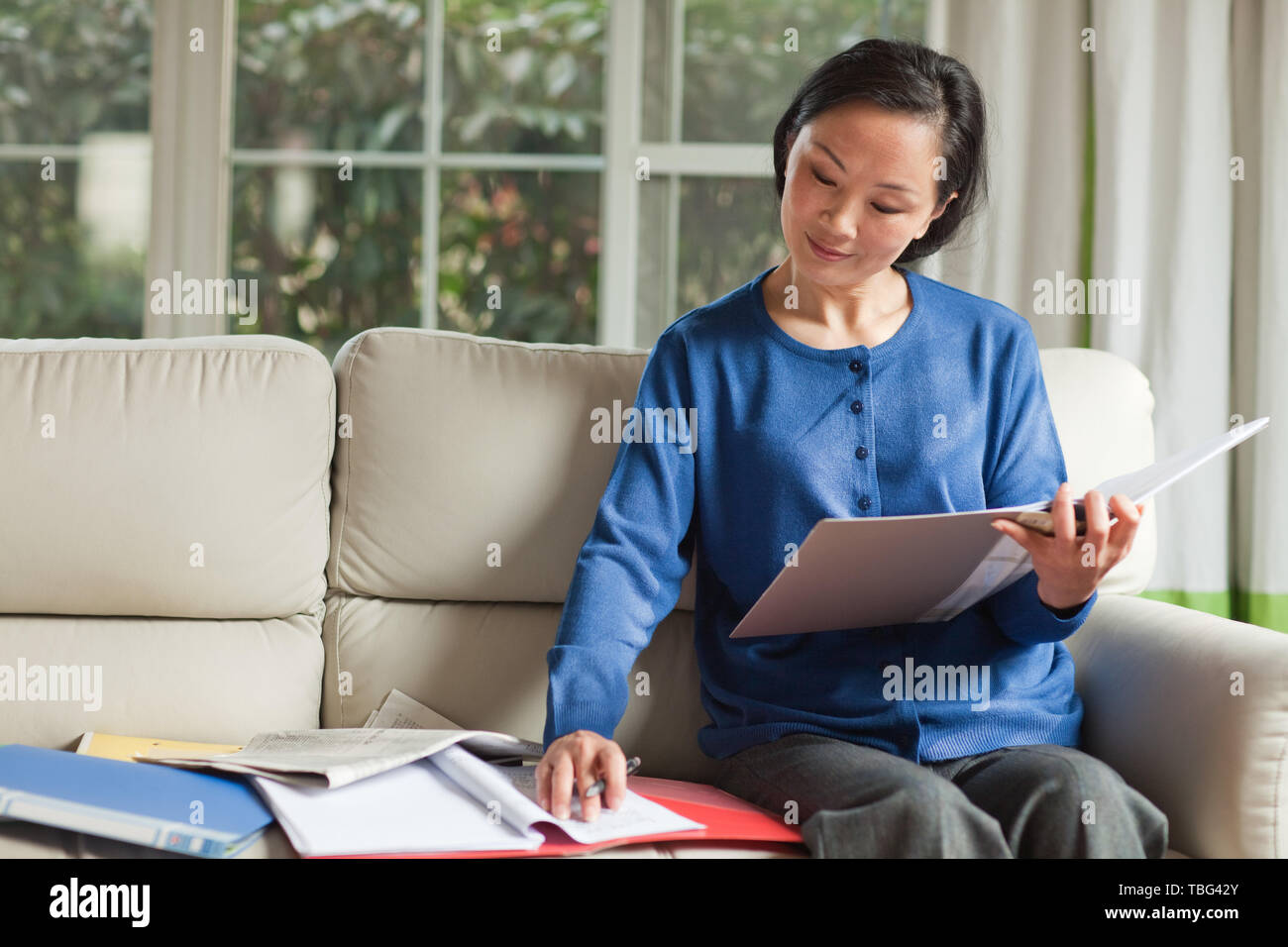 An old man is reading. Stock Photo