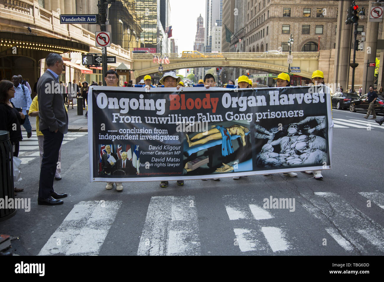 International members of Falun Dafa march from the UN to the Chinese Consulate in NYC demanding the end of the persecution of its members in China. Falun Dafa also Falun Gong Standard Mandarin Chinese: [fàlwə̌n tâfà]; literally, 'Dharma Wheel Practice' or 'Law Wheel Practice') is a Chinese religious spiritual practice that combines meditation and qigong exercises with a moral philosophy centered on the tenets of truthfulness, compassion, and forbearance (Chinese: 真、善、忍). The practice emphasizes morality and the cultivation of virtue, and identifies as a qigong practice of the Buddhist schoo Stock Photo