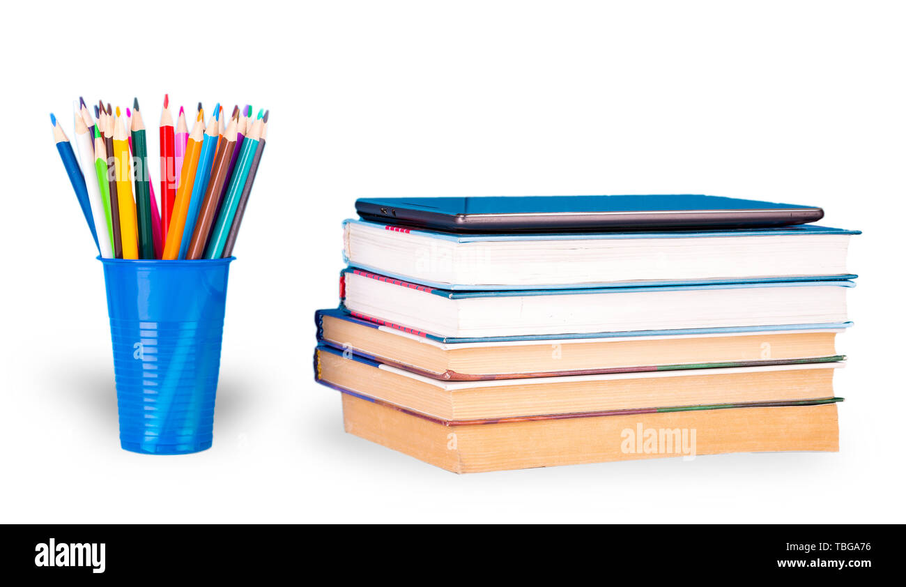 books and color pencils on white background Stock Photo