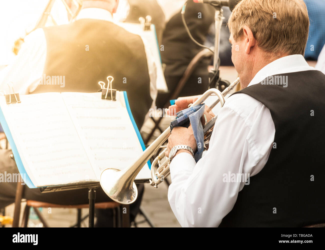 the musician plays the trumpet in the city orchestra Stock Photo Alamy