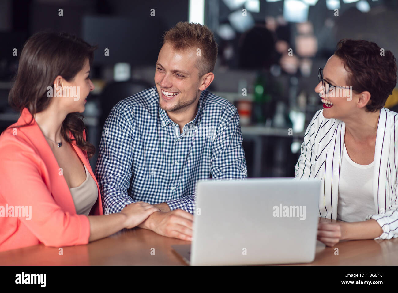 Investment Adviser Giving A Presentation To A Friendly Smiling