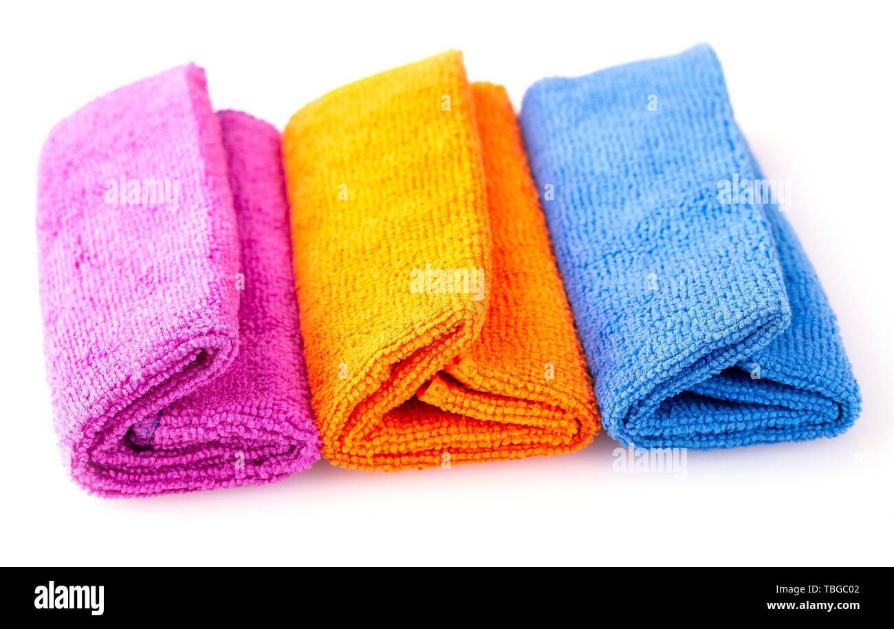 Stack of color microfiber cloths isolated on white background Stock