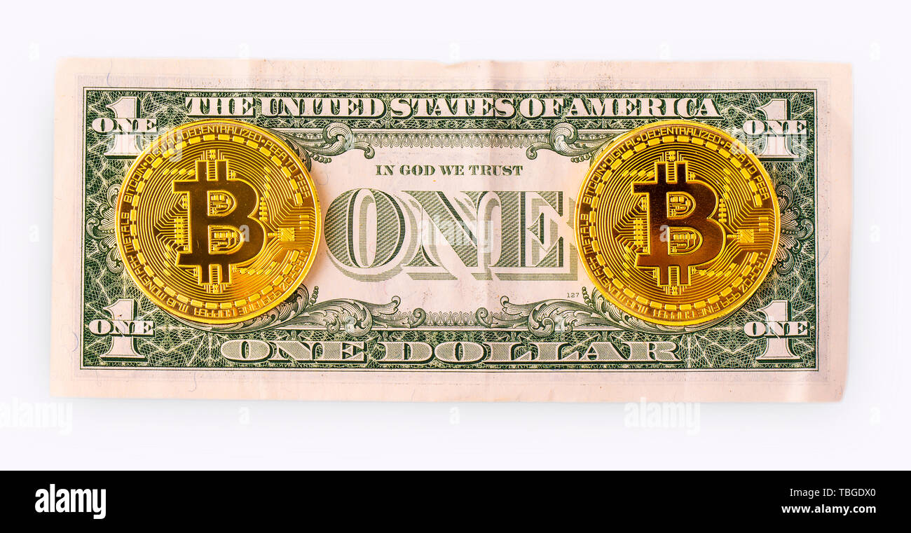 Golden bitcoin on us dollar bills electronic money exchange concept Stock  Photo - Alamy