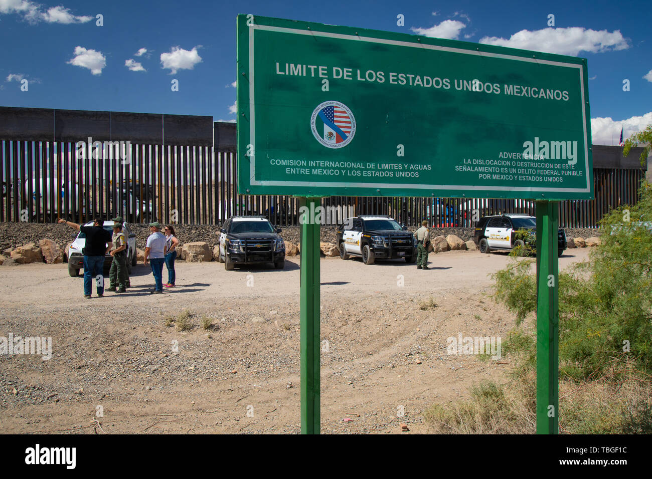 Police officers park between the privately funded border wall and the US-Mexico border on 30 May 2019 Stock Photo