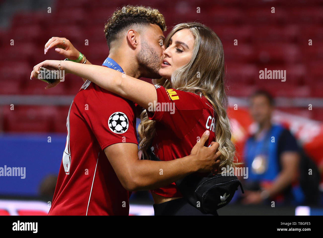 Alex Oxlade-Chamberlain of Liverpool kisses his girlfriend and Little Mix performer, Perrie Edwards - Tottenham Hotspur v Liverpool, UEFA Champions League Final 2019, Wanda Metropolitano Stadium, Madrid - 1st June 2019 Stock Photo