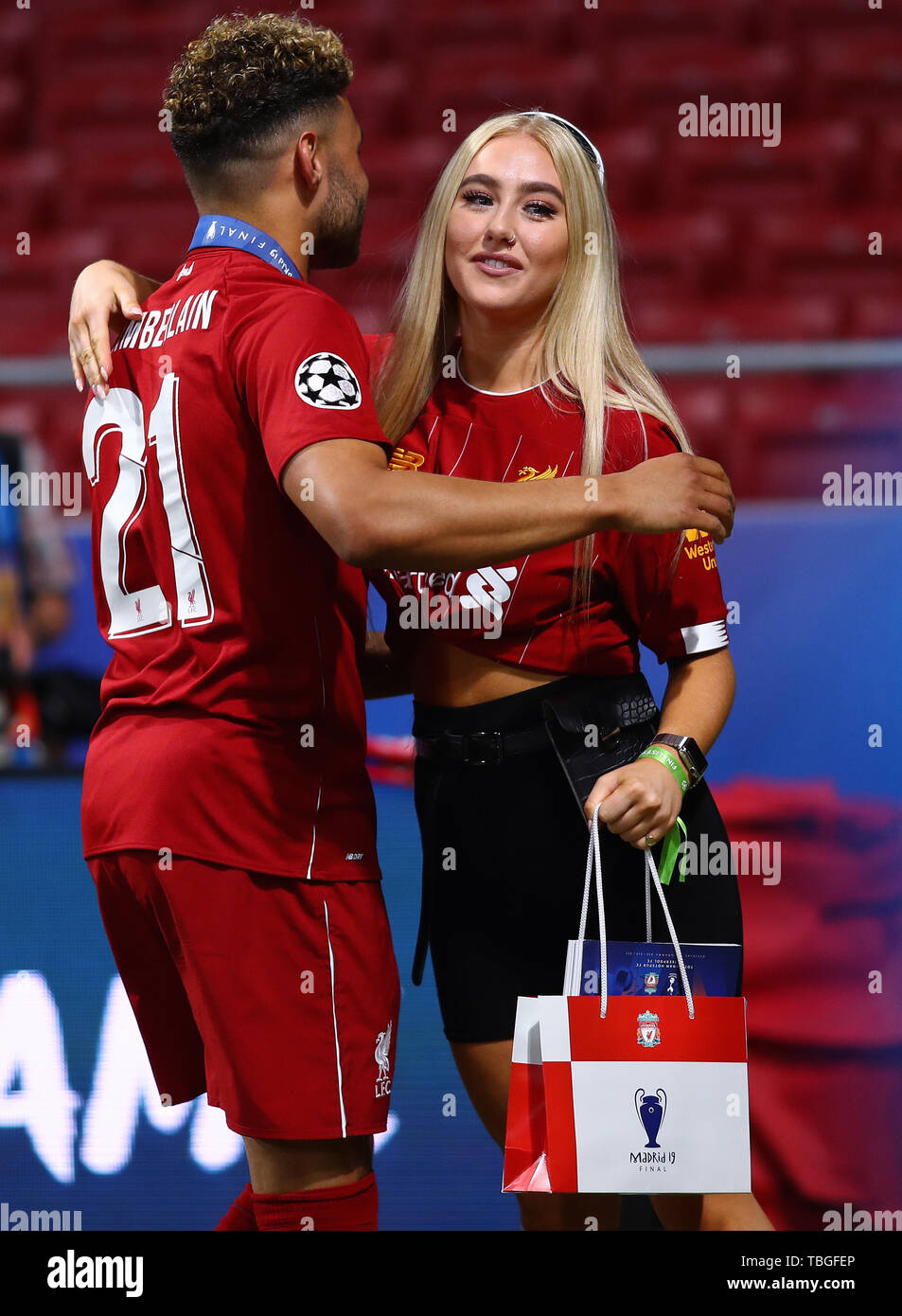 Alex Oxlade-Chamberlain of Liverpool with Ellie Hemmings, cousin of his  girlfriend and Little Mix performer, Perrie Edwards - Tottenham Hotspur v  Liverpool, UEFA Champions League Final 2019, Wanda Metropolitano Stadium,  Madrid -