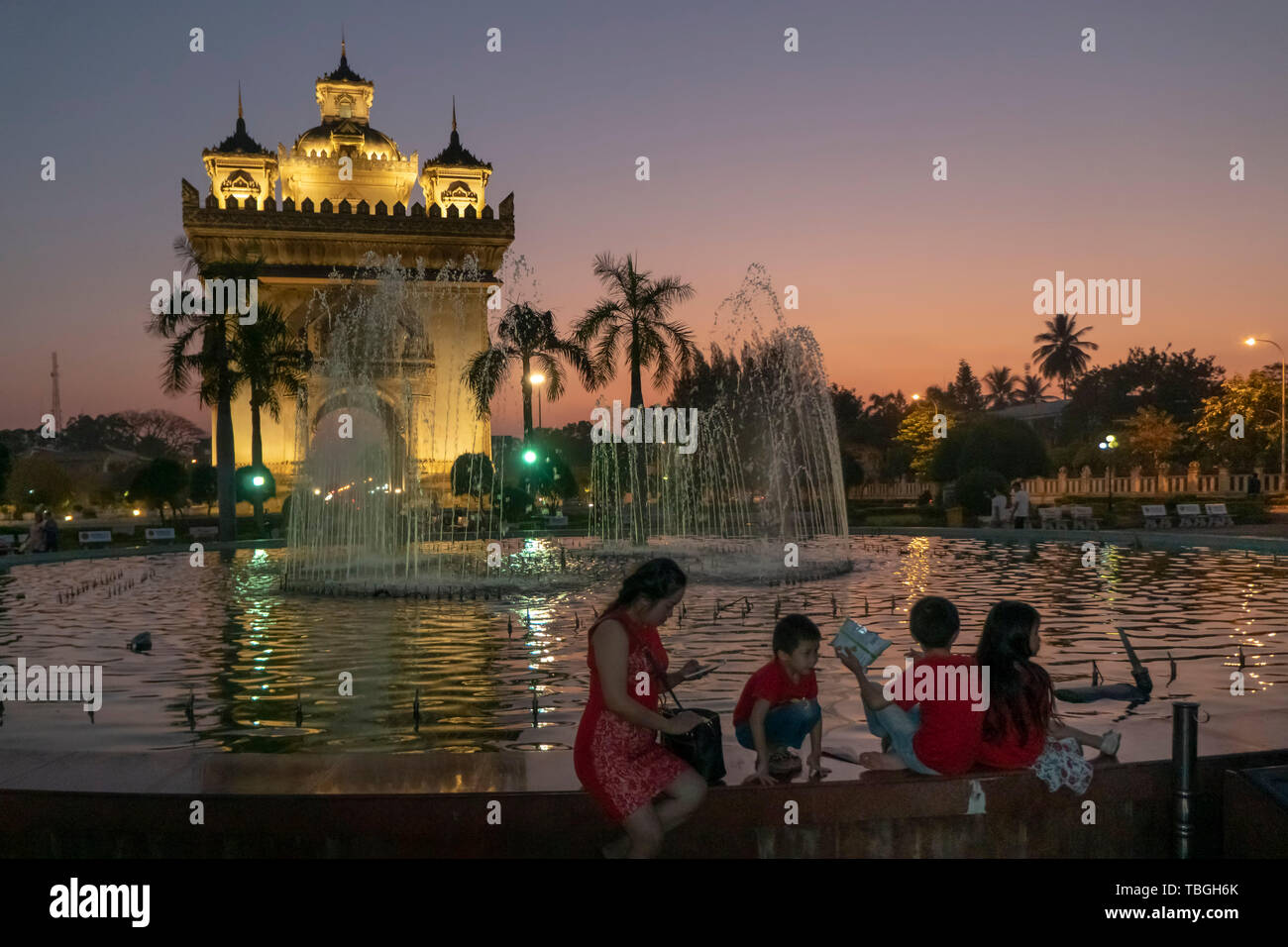 Patuxai Monument, fountain, twilight, Vientiane, Laos Stock Photo